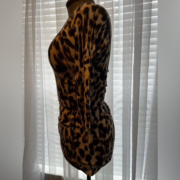 Guess cheetah print stretchy dress with black lace in the back. - Picture 8 of 13